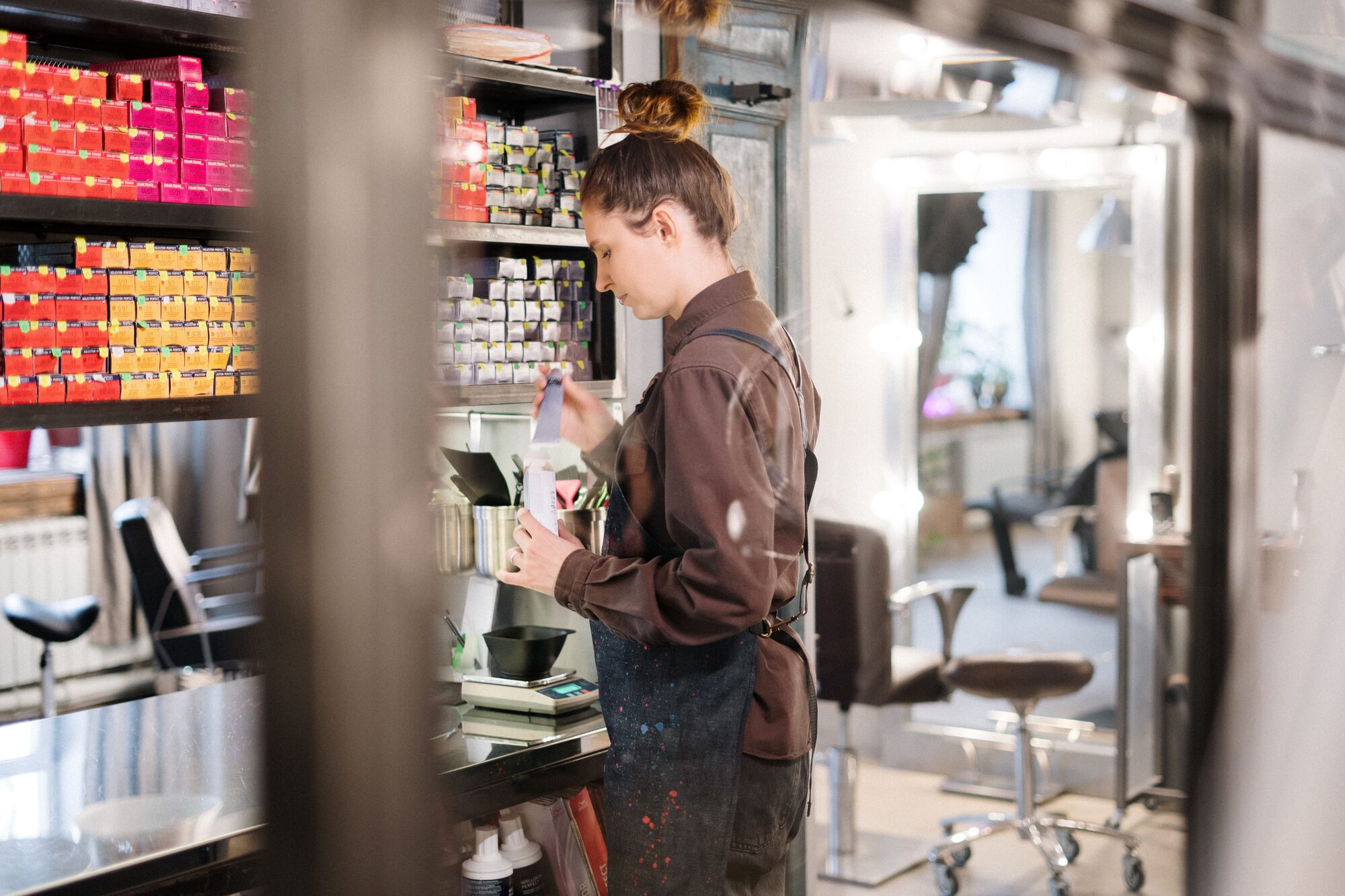 Salon colorist preparing a hair color treatment